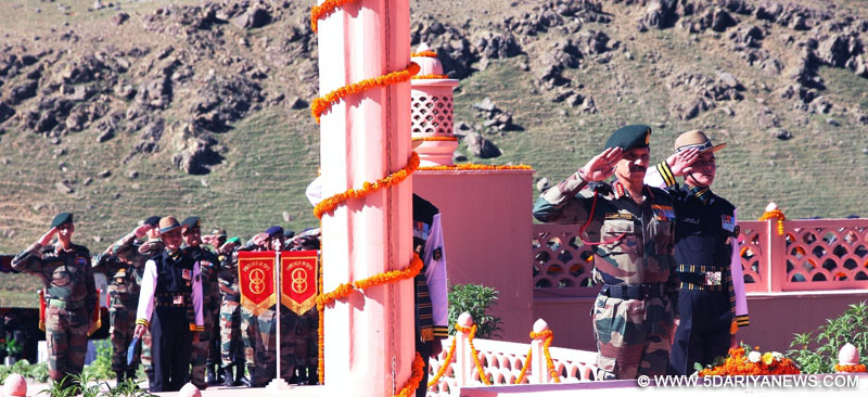 Drass: The Chief of Army Staff, General Dalbir Singh pays homage to the Kargil Martyrs on the occasion of Kargil Vijay Diwas at Kargil War Memorial in Drass on July 25, 2015. 