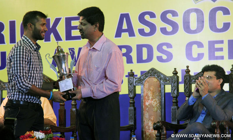 Kolkata: Former India captain and chief selector Krishnamachari Srikkanth with CAB Join Secretary Sourav Ganguly during the Cricket Association of Bengal`s annual awards ceremony in Kolkata on July 25, 2015. 