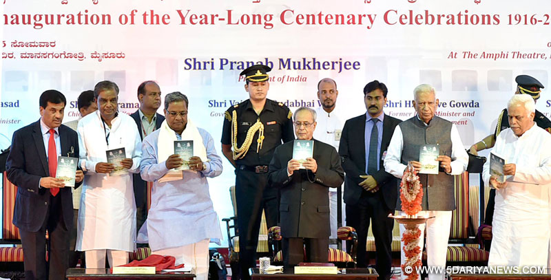 Pranab Mukherjee releasing a book at the inauguration of the Centenary Celebrations of the University of Mysore, in Karnataka 