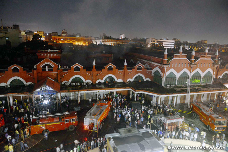 Firefighter at New Market in Kolkata on July 30, 2015. A fire broke out in the 138-year-old historic New Market in the heart of Kolkata