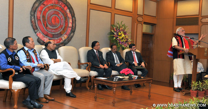 The Prime Minister, Shri Narendra Modi addressing at the signing ceremony of historic peace accord between Government of India & NSCN, in New Delhi on August 03, 2015. The Union Home Minister, Shri Rajnath Singh and other dignitaries are also seen.