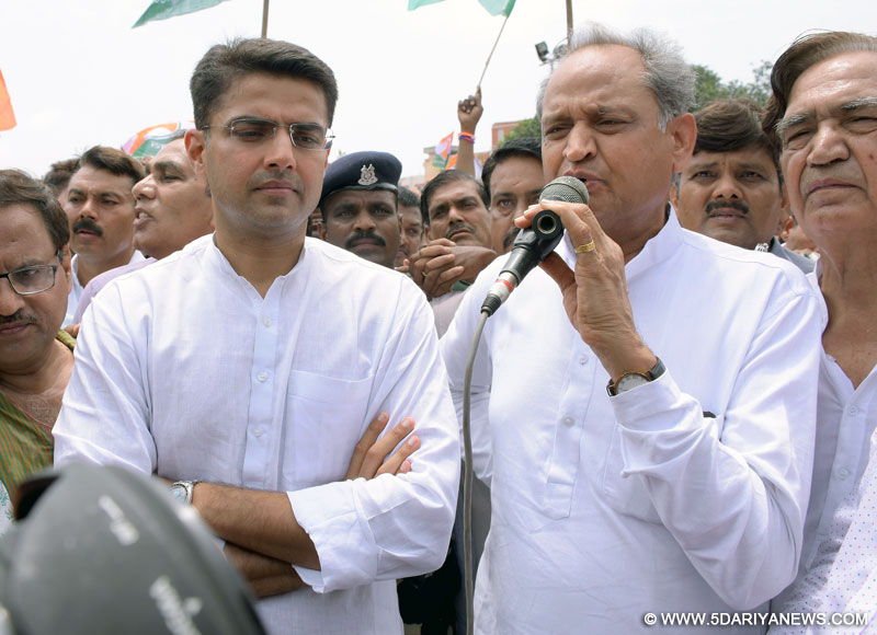 Jaipur: Rajasthan Congress chief Sachin Pilot and former chief minister Ashok Gehlot participate in a demonstration against suspension of party MPs in Jaipur, on Aug 4, 2015. 