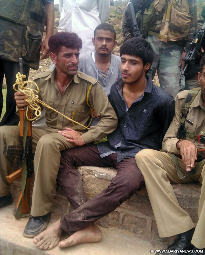 Jammu: The alleged militant who was involved in an ambush on a BSF convoy on the Jammu-Srinagar highway after being captured; in Udhampur district of Jammu and Kashmir on Aug 5, 2015. - See more at: http://www.5dariyanews.com/news/96825-Three-killed-in-militant-attack-on-Jammu-Srinagar-highway#sthash.xcSMG5mD.dpuf