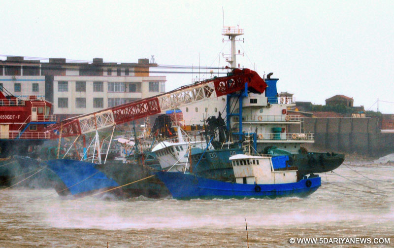 Fishing boats are seen at a wharf in Putian City, southeast China
