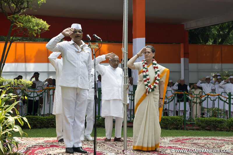 Congress chief Sonia Gandhi salutes the national flag at AICC headquarters on the occasion of 69th ``Independence Day`` celebration in New Delhi, on Aug 15, 2015.