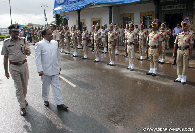 Goa Chief Minister Laxmikant Parsekar inspects the Guard of Honor by Goa Police on the occasion of 69th ``Independence Day`` celebration in Panaji, on Aug 15, 2015. 
