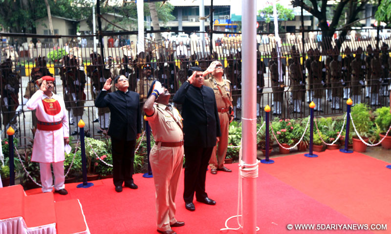 Maharashtra Chief Minister Devendra Fadnavis salutes the national flag on the occasion of 69th ``Independence Day`` celebration in Mumbai, on Aug 15, 2015.