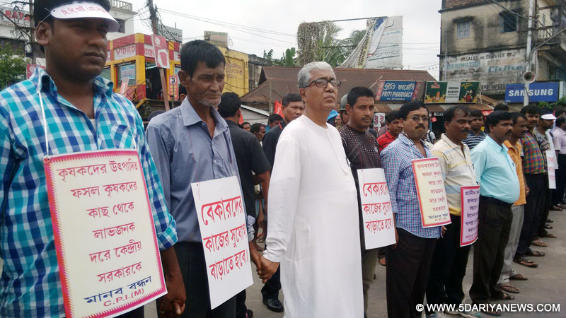 Agartala: Tripura Chief Minister Manik Sarkar participates in a CPI-M protest against Modi led central government in Agartala, on Aug 19, 2015. 