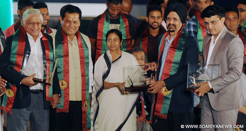 West Bengal Chief minister Mamata Banerjee, Minister of State for Youth Affairs and Sports (Independent Charge), Sarbananda Sonowal, former Indian cricketer Sourav Ganguly and former footballer Chuni Goswami during the 125th years celebration of Mohun Bagan Club in Kolkata, on Aug 22, 2015. 