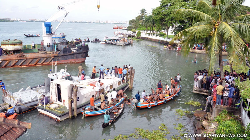 Kochi: Security personnel carry out rescue operations at the site where two boats collided near Fort Kochi, in Kochi on Aug 26, 2015. 