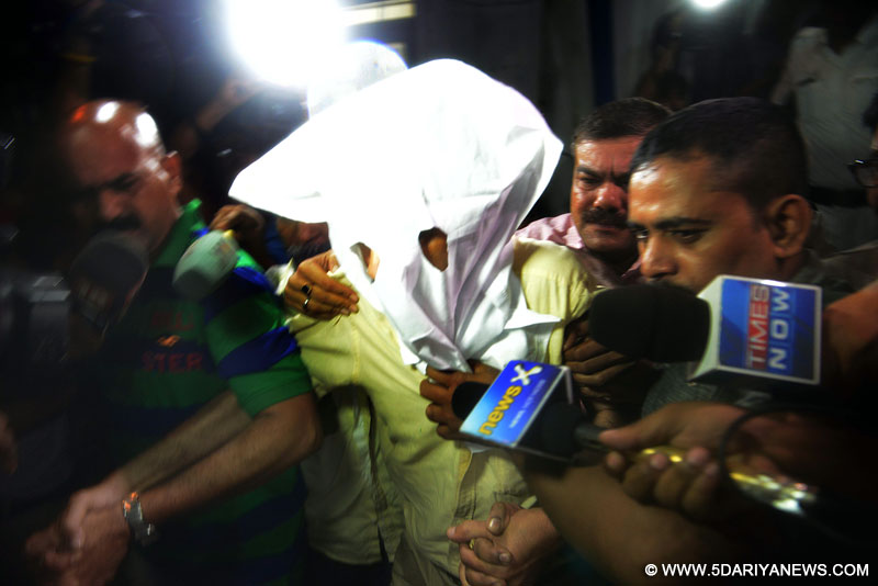 Sanjeev Khanna, former husband of Indrani Mukherjea who was detained on charges of killing Sheena Bora, being taken away by police from Mumbai; in Kolkata, on Aug 26, 2015