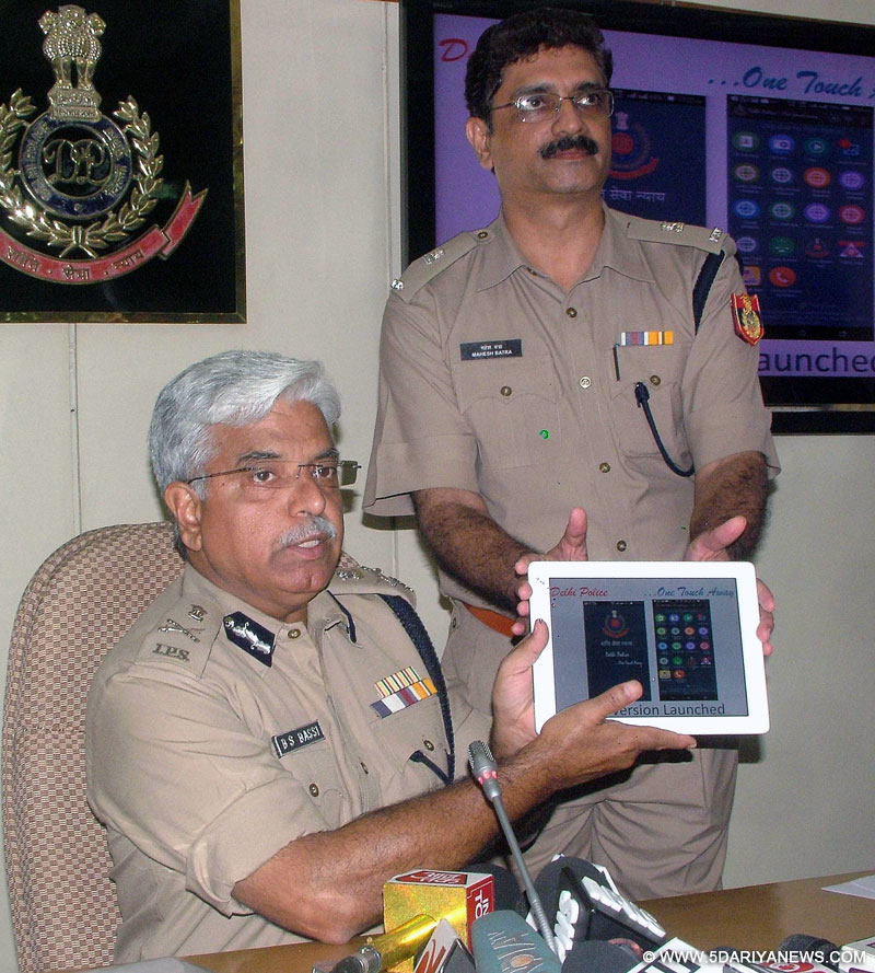 Delhi Police Commissioner B S Bassi at the launch of `Delhi Police ...One touch away`- mobile app at Police Headquarters in New Delhi, on Aug 28, 2015. 