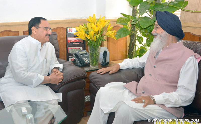 The Chief Minister of Punjab,  Prakash Singh Badal meeting the Union Minister for Health & Family Welfare, J.P. Nadda, in New Delhi on August 28, 2015. 