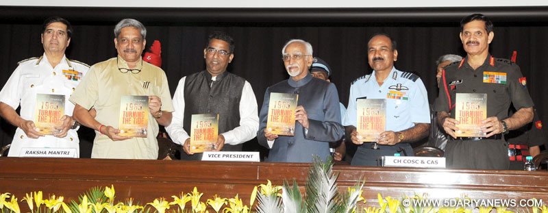The Vice President, Shri Mohd. Hamid Ansari releasing a book titled ‘1965 Turning The Tide’, at the inauguration of the “Tri-Services Seminar to commemorate the Golden Jubilee Commemoration of the India-Pakistan War of 1965”, in New Delhi on September 01, 2015. The Union Minister for Defence, Shri Manohar Parrikar and three Service Chiefs, General Dalbir Singh, Admiral R.K. Dhowan and Air Chief Marshal Arup Raha are also seen.
