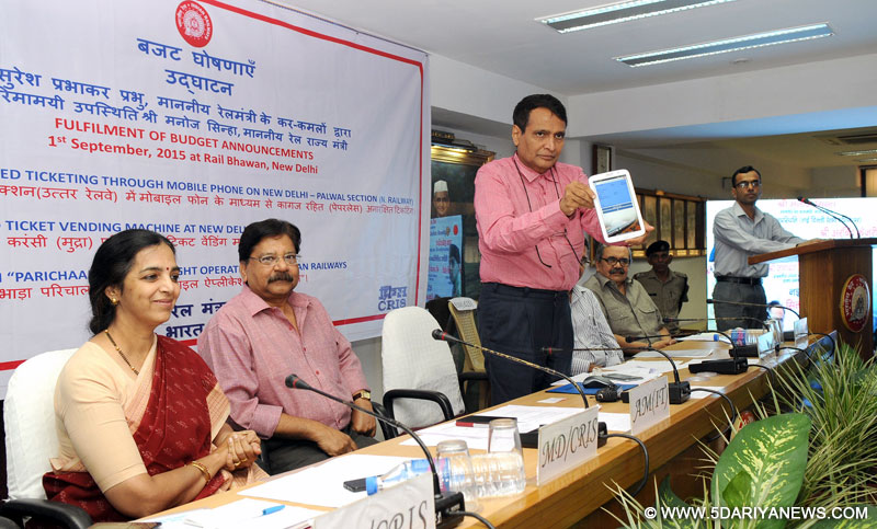 The Union Minister for Railways, Shri Suresh Prabhakar Prabhu launching the Mobile Application for Freight Operations (PARICHAALAN), developed by the Centre for Railway Information Systems (CRIS), through Video conferencing from Rail Bhavan, in New Delhi on September 01, 2015. The Chairman, Railway Board, Shri A.K. Mital and other Board Members are also seen.