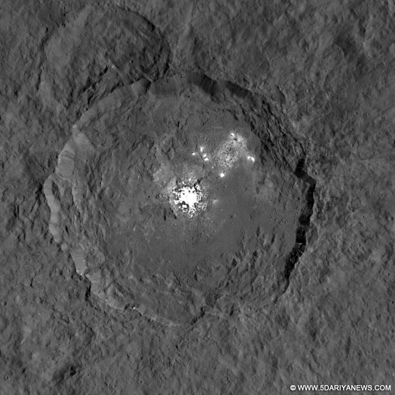 This image shows Occator crater on Ceres, home to a collection of intriguing bright spots.. (Photo: NASA)