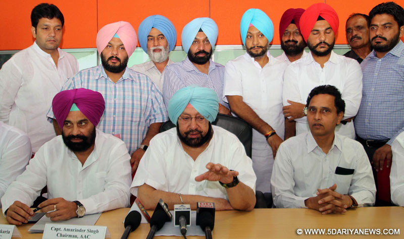 Congress MP Capt. Amrinder Singh addresses a press conference after meeting with the Airports Authority of India at Sri Guru Ram Das Jee International Airport in Amritsar on Sep 10, 2015. 