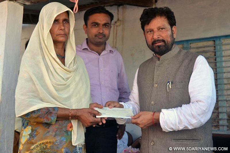 Chaudhary Lal Singh distributes compensation among Dubb landslide victims
