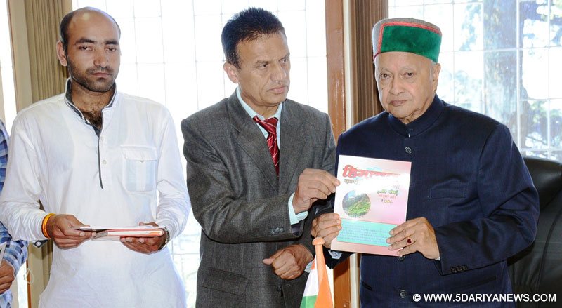 Chief Minister Shri Virbhadra Singh releasing a monthly magazine titled ‘Himachal Competition Focus’ edited by Dr. Rajinder Atri at Shimla on 11Sep  2015
