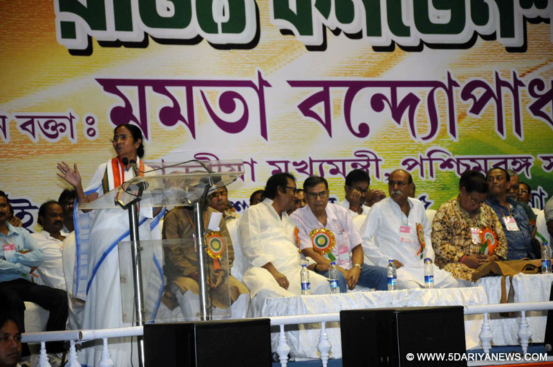 West Bengal Chief Minister Mamata Banerjee addresses during a convention of West Bengal State Government Employees Federation in Kolkata on Sep 11, 2015. 