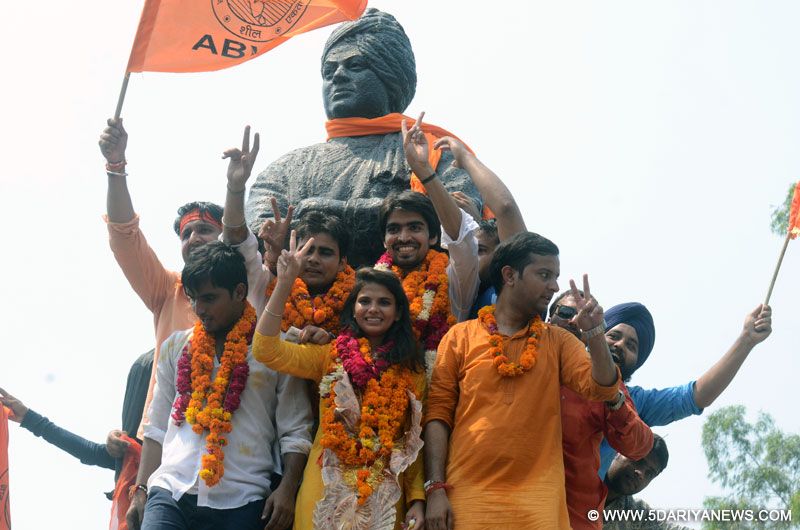 The candidates of the ABVP celebrates after the declaration of Delhi University Students` Union (DUSU) election 2015 results in Delhi on Sep 12, 2015. ABVP swept the Delhi University Students Union (DUSU) elections winning all the four posts with spectacular margins. 