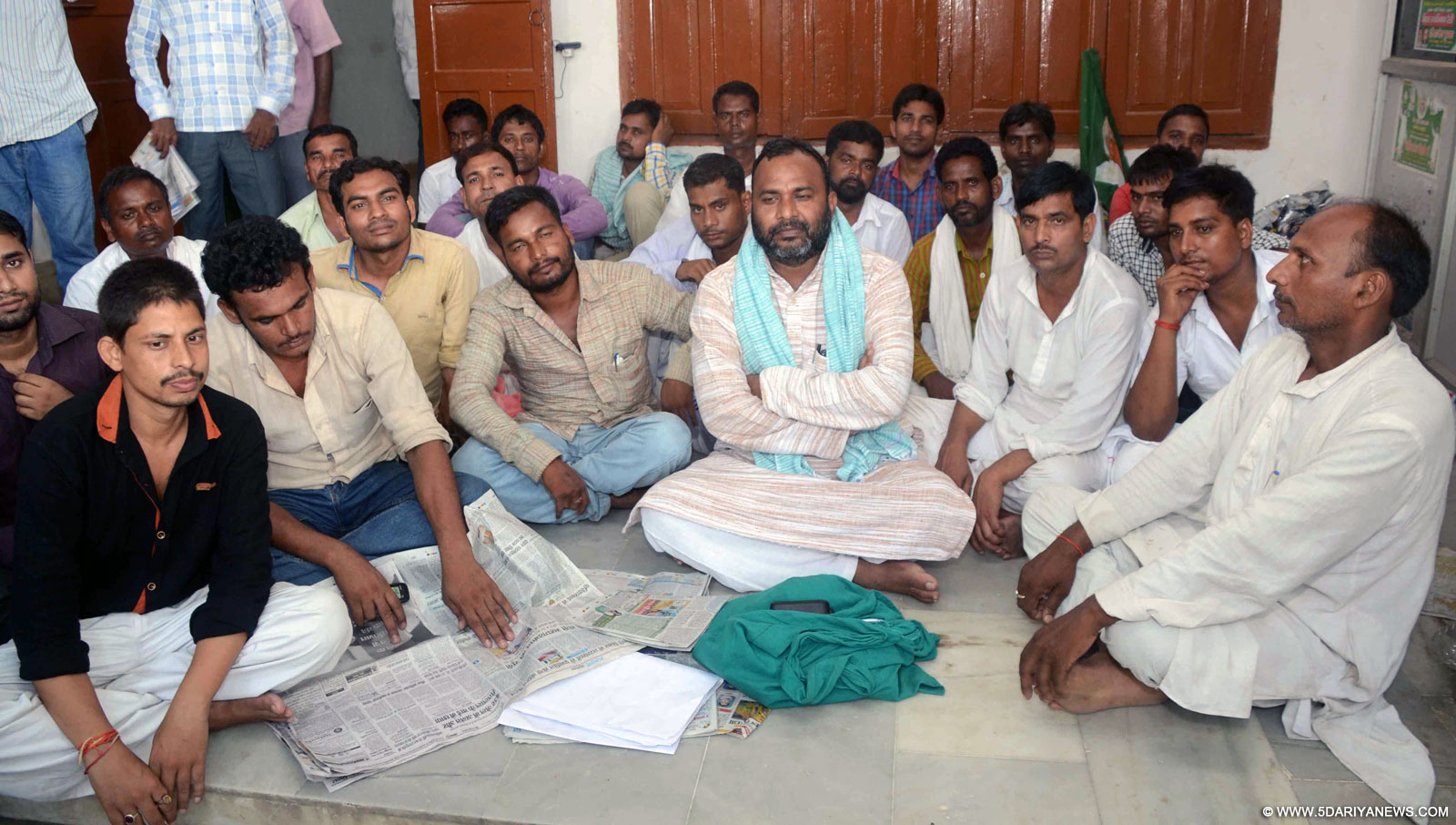 Rashtriya Janata Dal legislator Bhai Dinesh sit on dharna in front of the party office after not getting the party ticket from the Jagdishpur assembly constituency in Bhojour district; in Patna on Sep 19, 2015