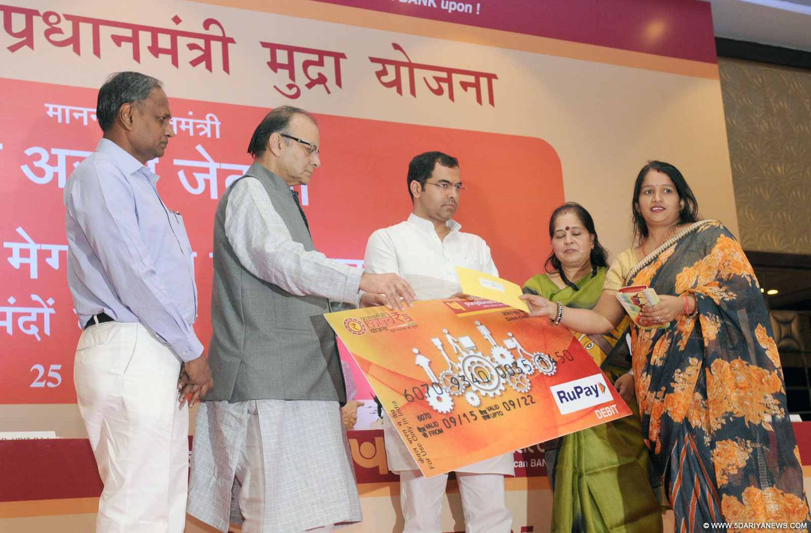 The Union Minister for Finance, Corporate Affairs and Information & Broadcasting, Shri Arun Jaitley handing over the loan sanction letters to micro entrepreneurs, during a Mega Credit Campaign, organised by the Punjab National Bank, in New Delhi on September 25, 2015. Dr. Udit Raj, local Member of Parliament and the MD & CEO, Punjab National Bank, Ms. Usha Ananthasubramanian are also seen.