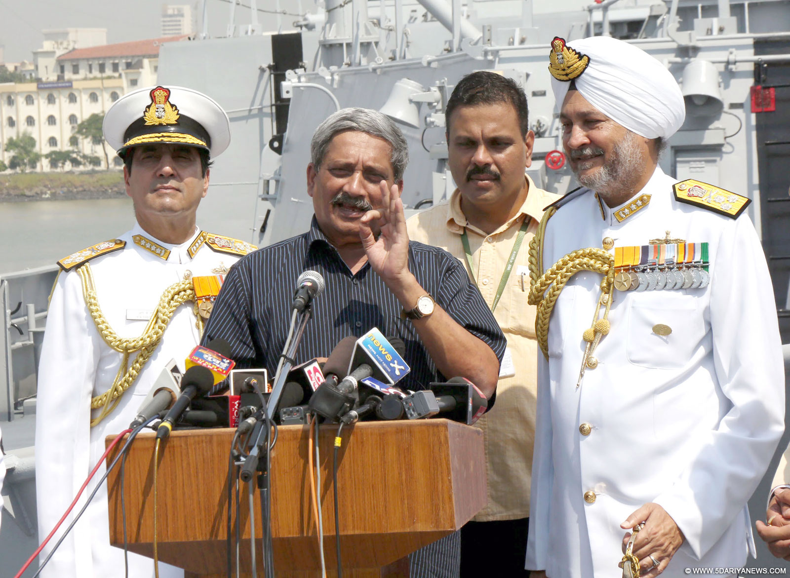 The Union Minister for Defence, Shri Manohar Parrikar commissioning the INS Kochi , at Naval Dockyard, in Mumbai on September 30, 2015. The Chief of Naval Staff, Admiral R.K. Dhowan and other dignitaries are also seen.