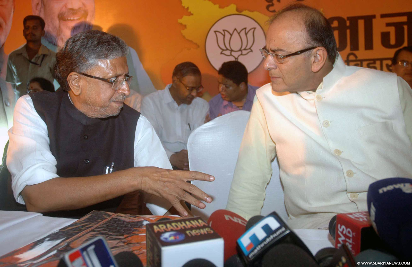 BJP promises free laptops, two-wheelers in poll manifesto