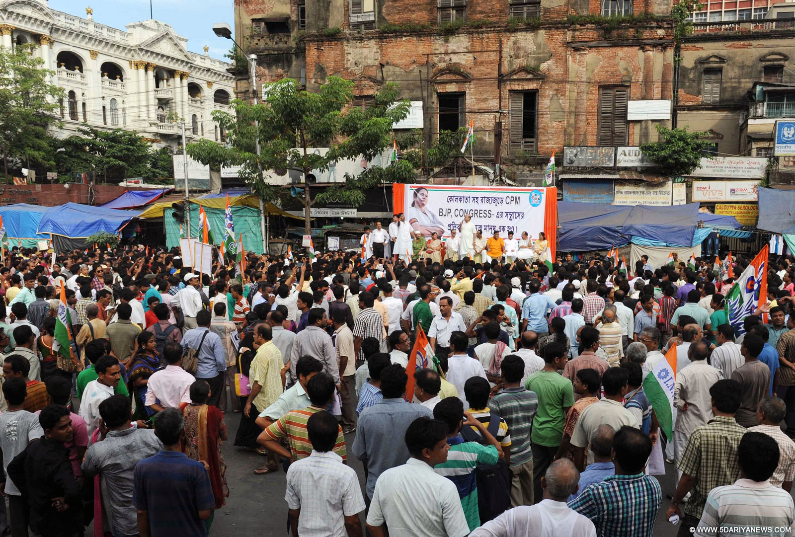 Trinamool Congress workers participate in a rally in in Kolkata, on Oct 6, 2015. 