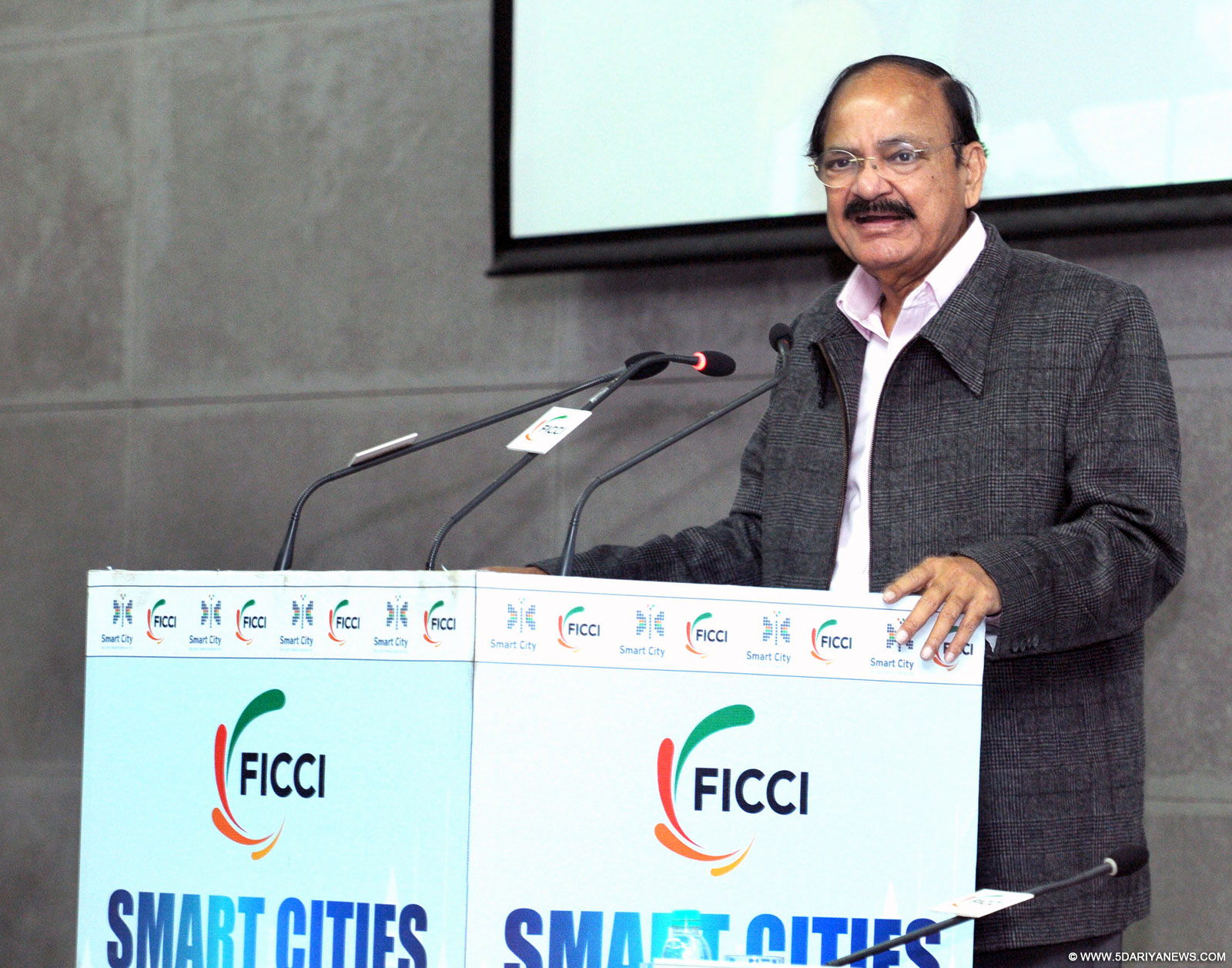 M. Venkaiah Naidu delivering the inaugural address at the Smart Cities Summit 2015, organised by the Federation of Indian Chambers of Commerce & Industry (FICCI), in New Delhi on October 08, 2015.