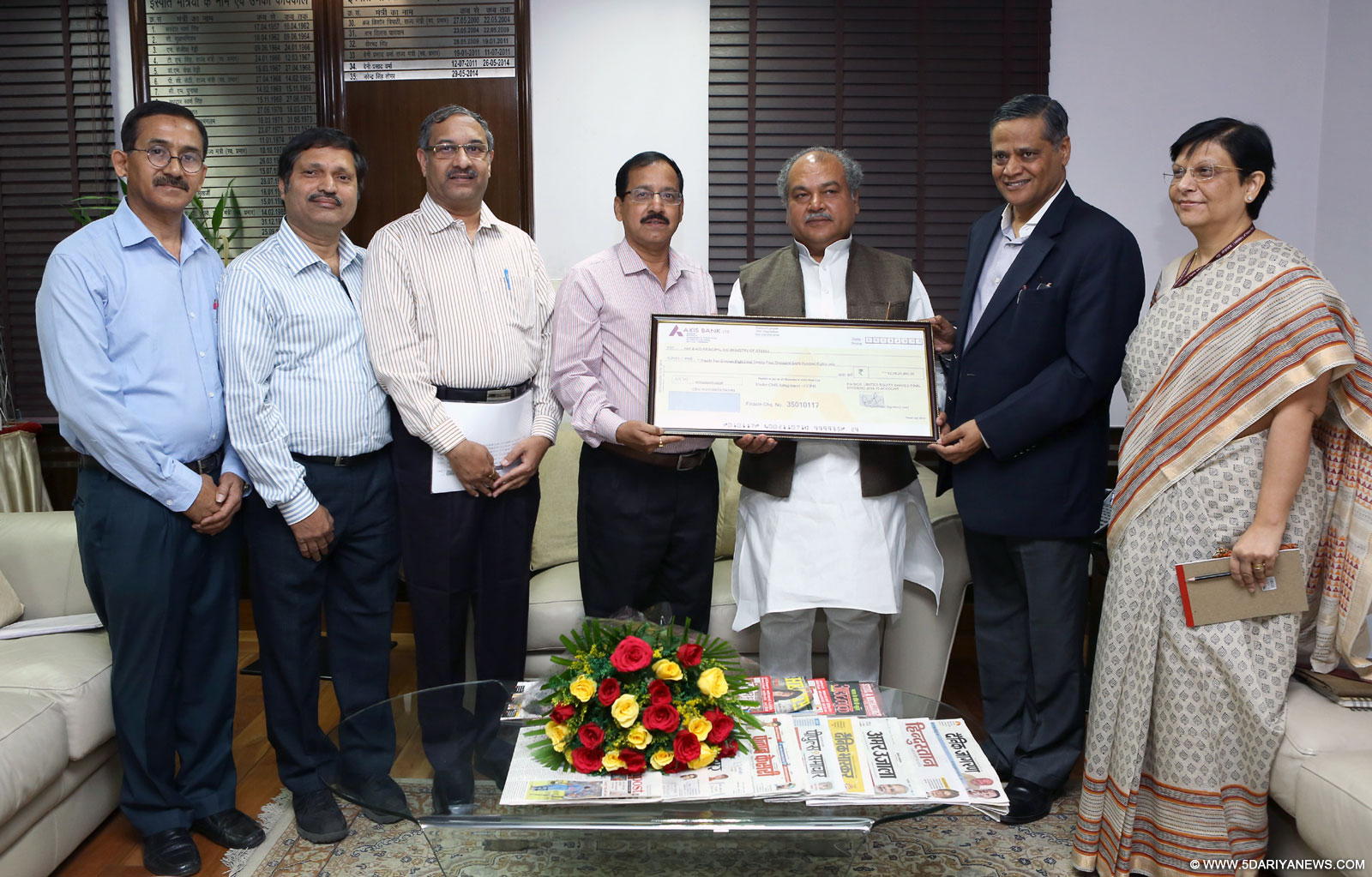 The Union Minister for Mines and Steel, Shri Narendra Singh Tomar being received a dividend cheque by the Chairman-cum-Managing Director of MOIL, Shri G.P Kundargi, in New Delhi on October 12, 2015. The Secretary, Ministry of Micro, Small & Medium Enterprises and Steel, Dr. Anup K. Pujari is also seen.