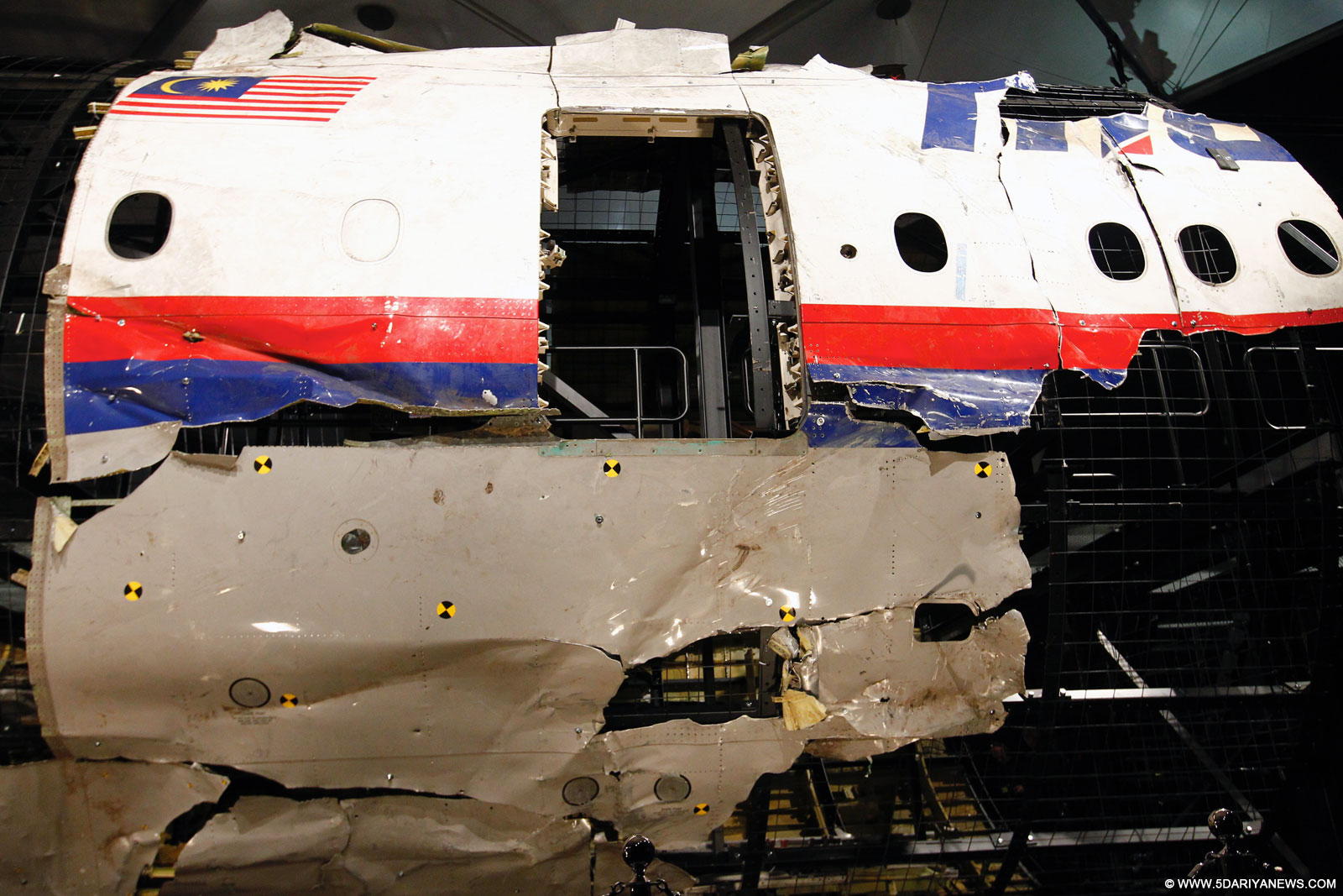 Wreckage of flight MH17 is seen after the presentation of the investigation report on the cause of its crash, at the Gilze-Rijen air base, the Netherlands