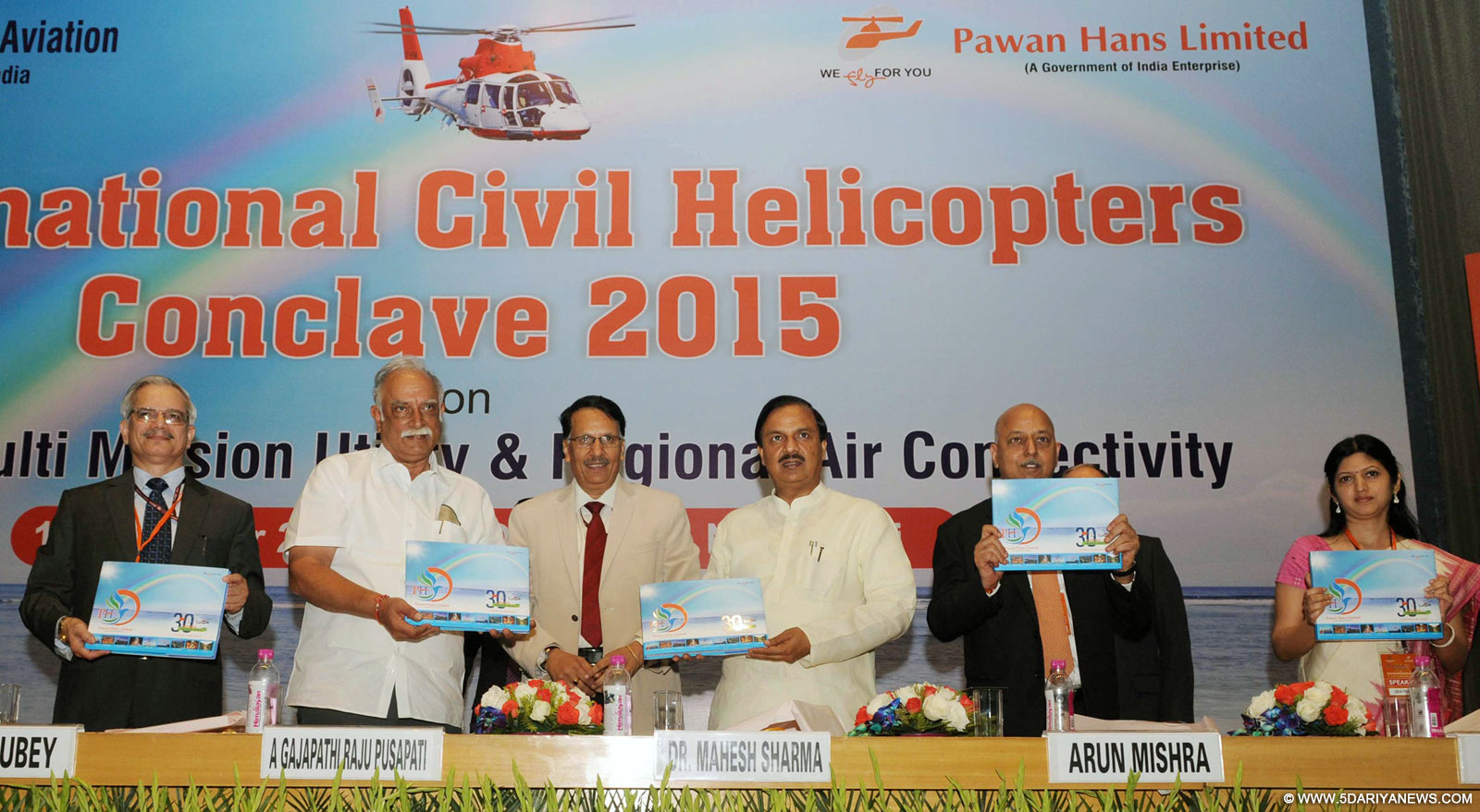 The Union Minister for Civil Aviation, Shri Ashok Gajapathi Raju Pusapati releasing the Pawan Hans Coffee table book, at the inauguration of the International Civil Helicopters Conclave 2015, in New Delhi on October 16, 2015. The Minister of State for Culture (Independent Charge), Tourism (Independent Charge) and Civil Aviation, Dr. Mahesh Sharma, the Secretary, Ministry of Civil Aviation, Shri R.N. Choubey and other dignitaries are also seen. 