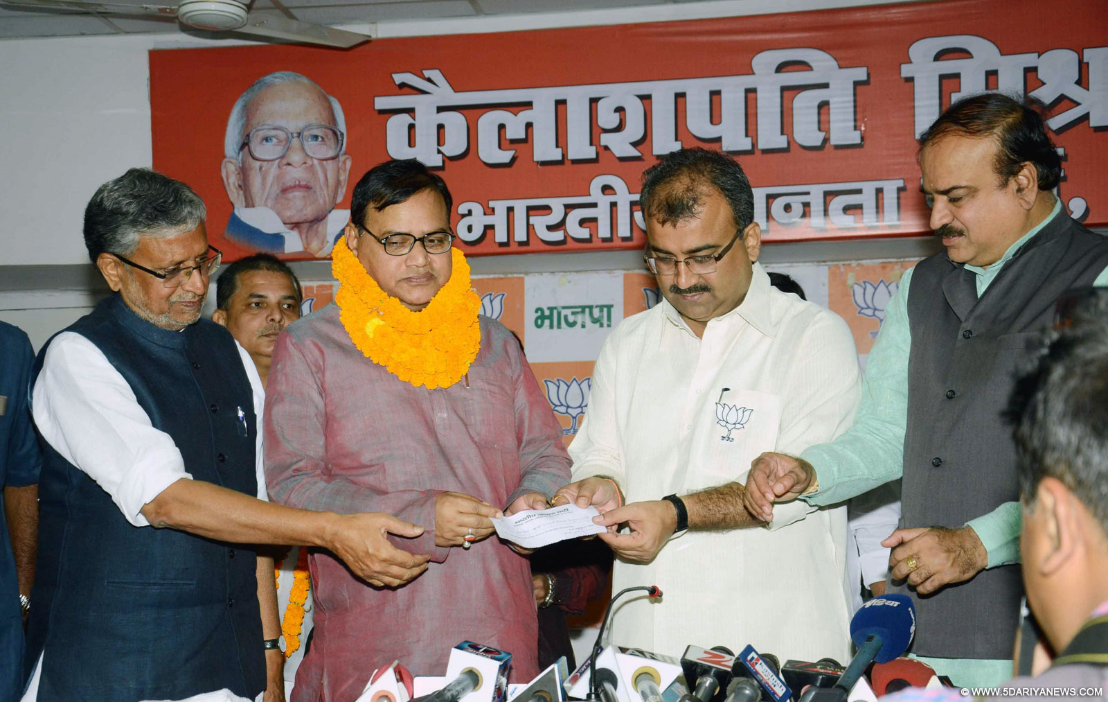 Bihar Industries Minister Bhim Singh joins BJP in presence of Union Chemical and Industries Minister Ananth Kumar, Bihar BJP chief Mangal Pandey and Sushil Kumar Modi in Patna, on Oct 23, 2015. 
