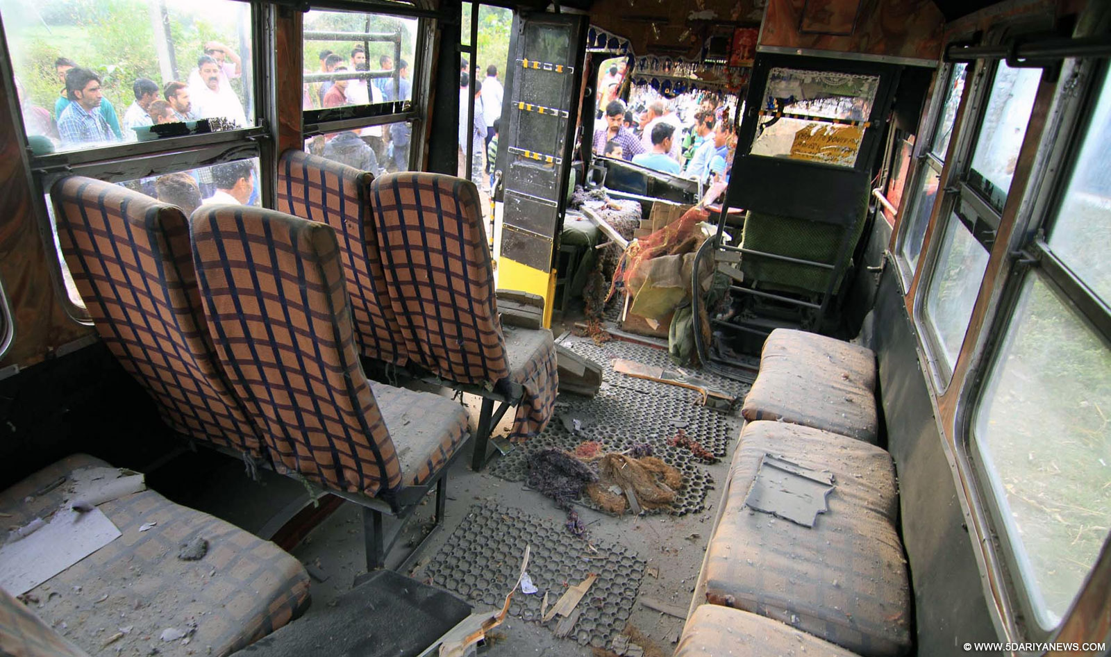 A mini-bus damaged in Pakistan shelling in Mawa village of Samba district of Jammu and Kashmir on Oct 24, 2015. 