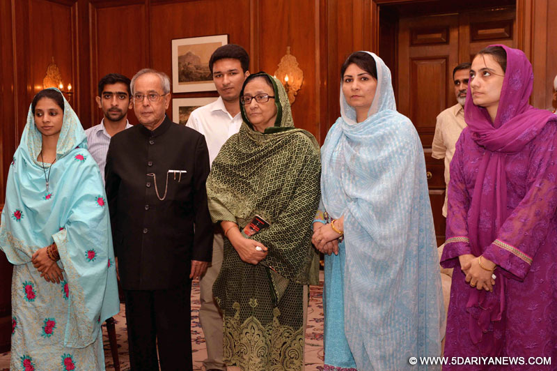Geeta, a deaf-mute Indian woman who had been stranded in Pakistan for over a decade calls on President Pranab Mukherjee in New Delhi, on Oct 27, 2015. 