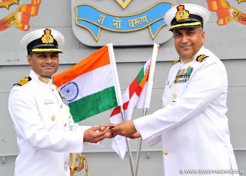 Capt. S. Berry exchanging the Baton with Capt. K. Swaminathan, on his taking over the Command of INS Vikramaditya, Indian Navy