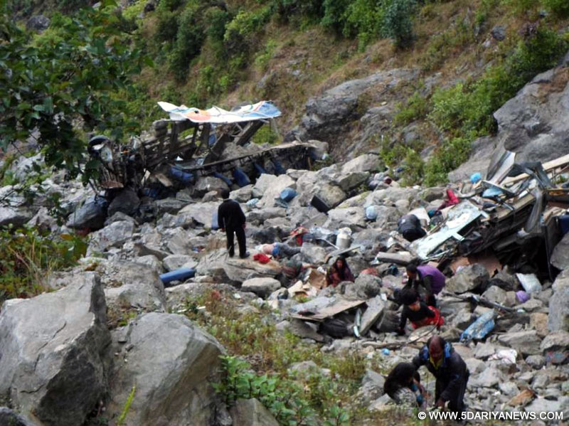 Photo taken on Nov. 3, 2015 shows a bus accident site in which 30 people were killed at Ramche in Rasuwa, Nepal. 