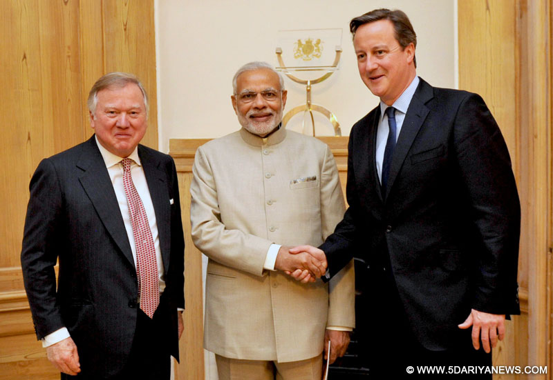 The Prime Minister, Shri Narendra Modi being received by the Prime Minister of United Kingdom (UK), Mr. David Cameroon and Mrs. Cameron at Wembley Stadium, in London on November 13, 2015.