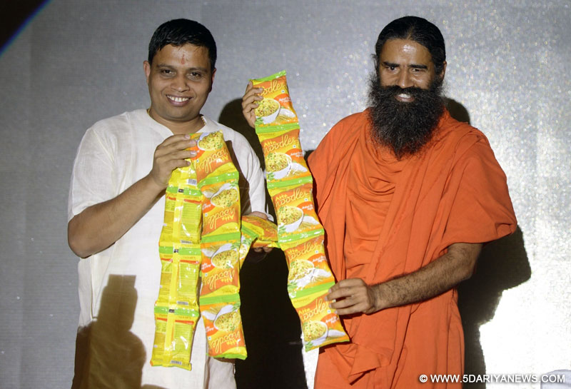 Yoga Guru Ramdev launches Patanjali noodles in New Delhi on Nov 16, 2015. 