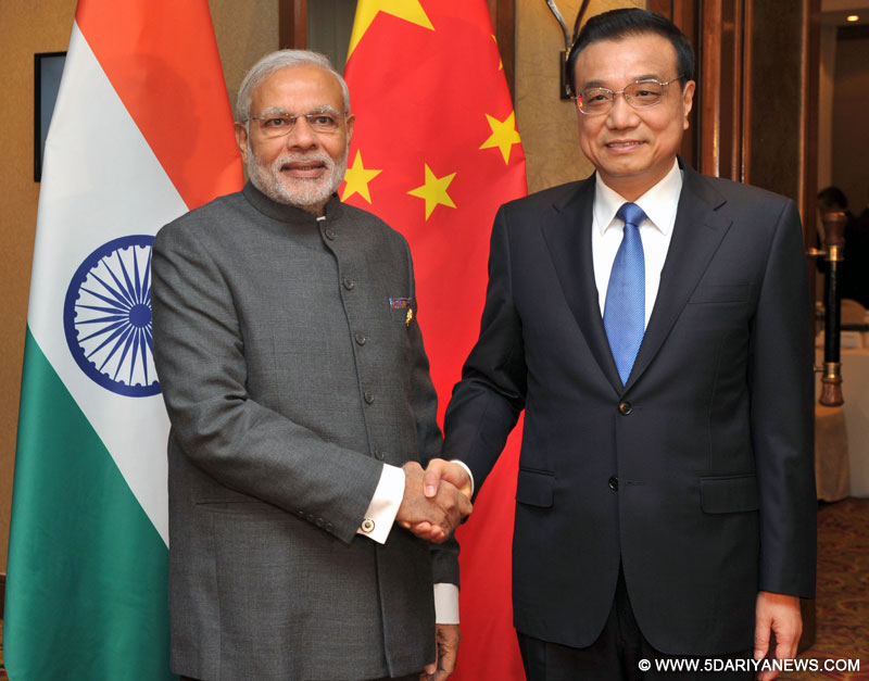 The Prime Minister, Shri Narendra Modi meeting the Prime Minister of China, Mr. Li Keqiang, at Kuala Lumpur, in Malaysia on November 21, 2015. 