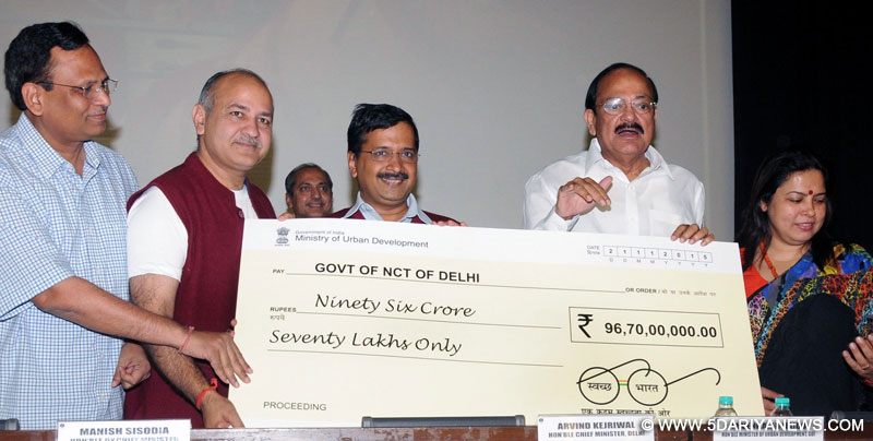 New Delhi: Union Minister for Urban Development, Housing and Urban Poverty Alleviation and Parliamentary Affairs M. Venkaiah Naidu, Delhi Chief Minister Arvind Kejriwal and Deputy Chief Minister Manish Sisodia at the launch of "Swachh Delhi Abhiyan" in New Delhi, on Nov 22, 2015. 