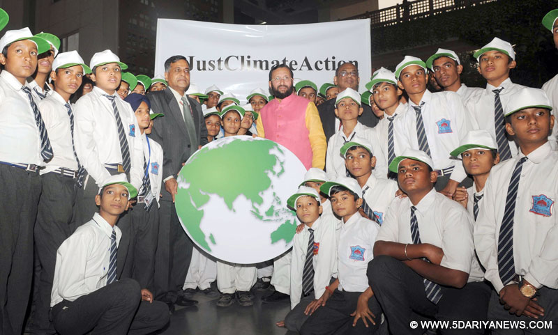A group of select school children presenting a symbolic Globe as best wishes, to the Minister of State for Environment, Forest and Climate Change (Independent Charge), Shri Prakash Javadekar, in New Delhi on November 27, 2015. The Secretary, Ministry of Environment, Forest and Climate Change, Shri Ashok Lavasa is also seen.
