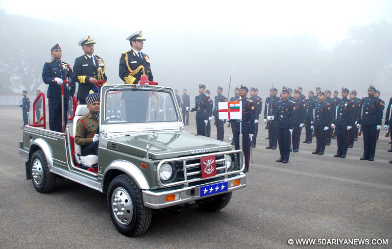 The Chief of Naval Staff, Admiral R.K. Dhowan reviewing the Guard of Honour at the Passing-out parade, at National Defence Academy (NDA), Khadakwasla, in Pune on November 28, 2015.