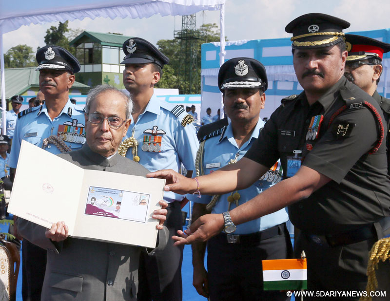 The President, Shri Pranab Mukherjee releasing a souvenir, at the President’s Standard presentation ceremony, at Hasimara, in West Bengal on November 28, 2015. The Chief of the Air Staff, Air Chief Marshal Arup Raha is also seen.