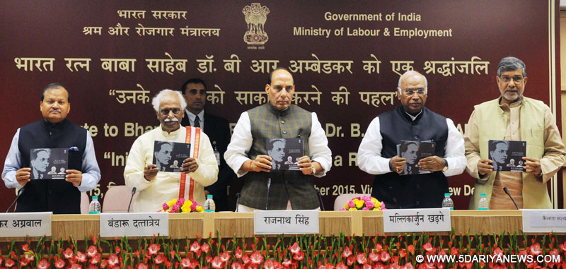The Union Home Minister, Shri Rajnath Singh releasing a booklet on Dr. B.R. Ambedkar to commemorate his 125th Birth Anniversary, in New Delhi on December 06, 2015. The Minister of State for Labour and Employment (Independent Charge), Shri Bandaru Dattatreya, the Secretary, Ministry of Labour and Employment, Shri Shankar Aggarwal and other dignitaries are also seen. 