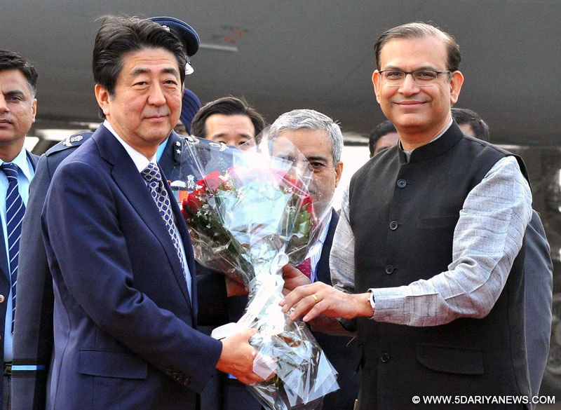 The Prime Minister of Japan, Mr. Shinzo Abe being received by the Minister of State for Finance, Shri Jayant Sinha, on his arrival, in New Delhi on December 11, 2015.
