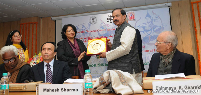 The Minister of State for Culture (Independent Charge), Tourism (Independent Charge) and Civil Aviation, Dr. Mahesh Sharma being presented a memento at the inauguration of the “International Conference on ‘India-Laos Inter-Cultural Linkages’’, organised by the Indira Gandhi National Centre for the Arts (IGNCA), New Delhi in collaboration with Shri Bharatvarshiya Digambar Jain Teerth Sanrakshini Mahasabha, New Delhi on December 11, 2015.
