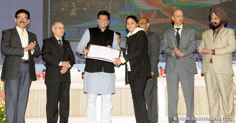 Piyush Goyal presented the National Painting Competition Prizes, at the National Energy Conservation Day function, in New Delhi on December 14, 2015. The Secretary, Ministry of Power, Shri P.K. Pujari and other dignitaries are also seen.